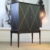 Schrank schwarz mit Blattgold – antik um 1940