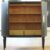 Schrank schwarz mit Blattgold-Linien – antik, um 1930